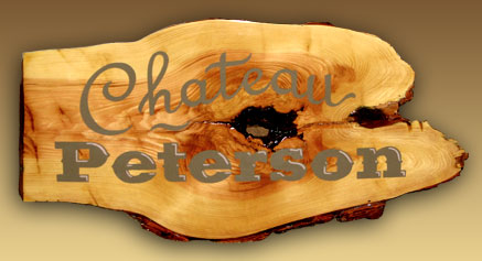 Hand-Painted Sign on a Log Slice